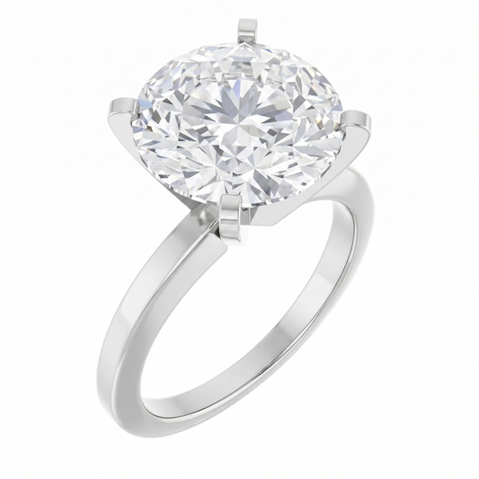 A silver ring with a large, round diamond set in the center.