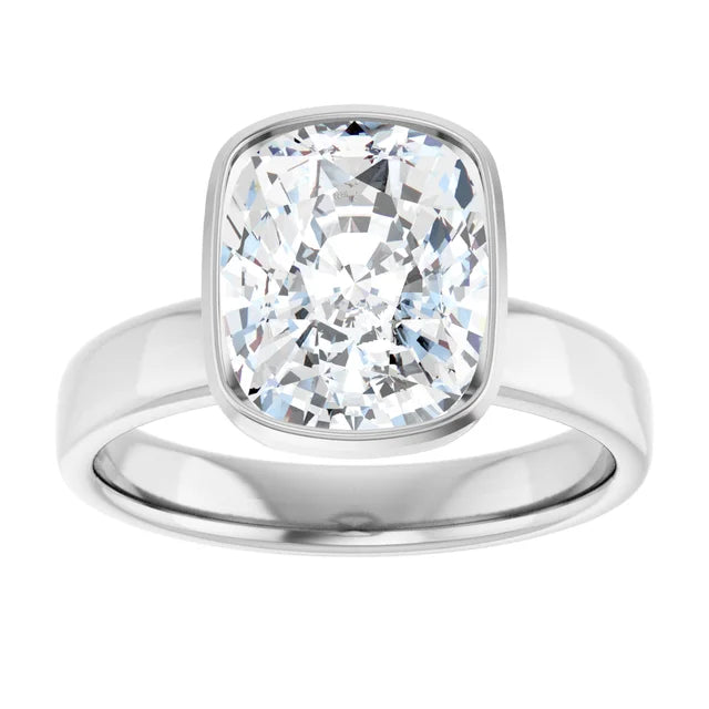 A silver ring with a large, brilliant-cut diamond set in the center.