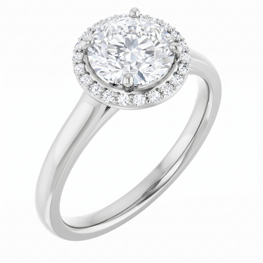 A silver engagement ring with a large, round diamond set in the center, surrounded by smaller diamonds.