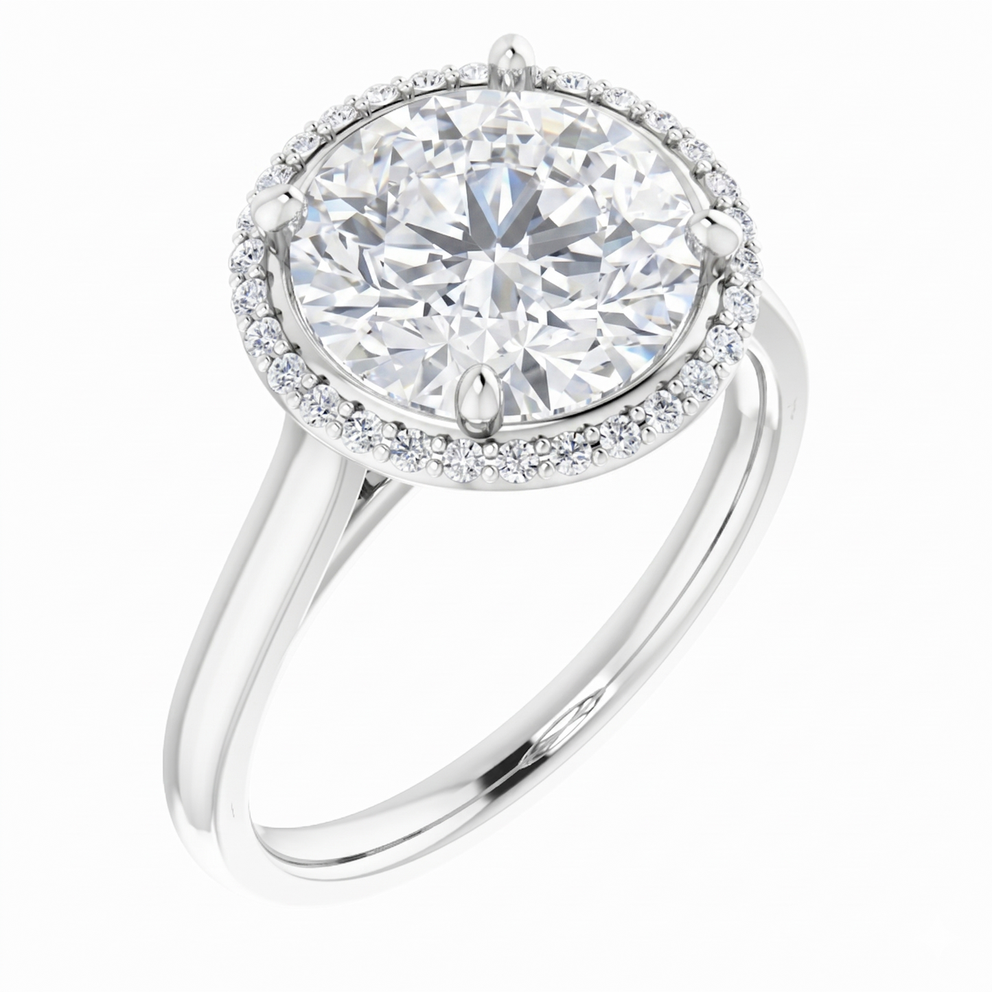 A beautiful diamond ring with a large, round brilliant cut diamond set in a halo of smaller diamonds.