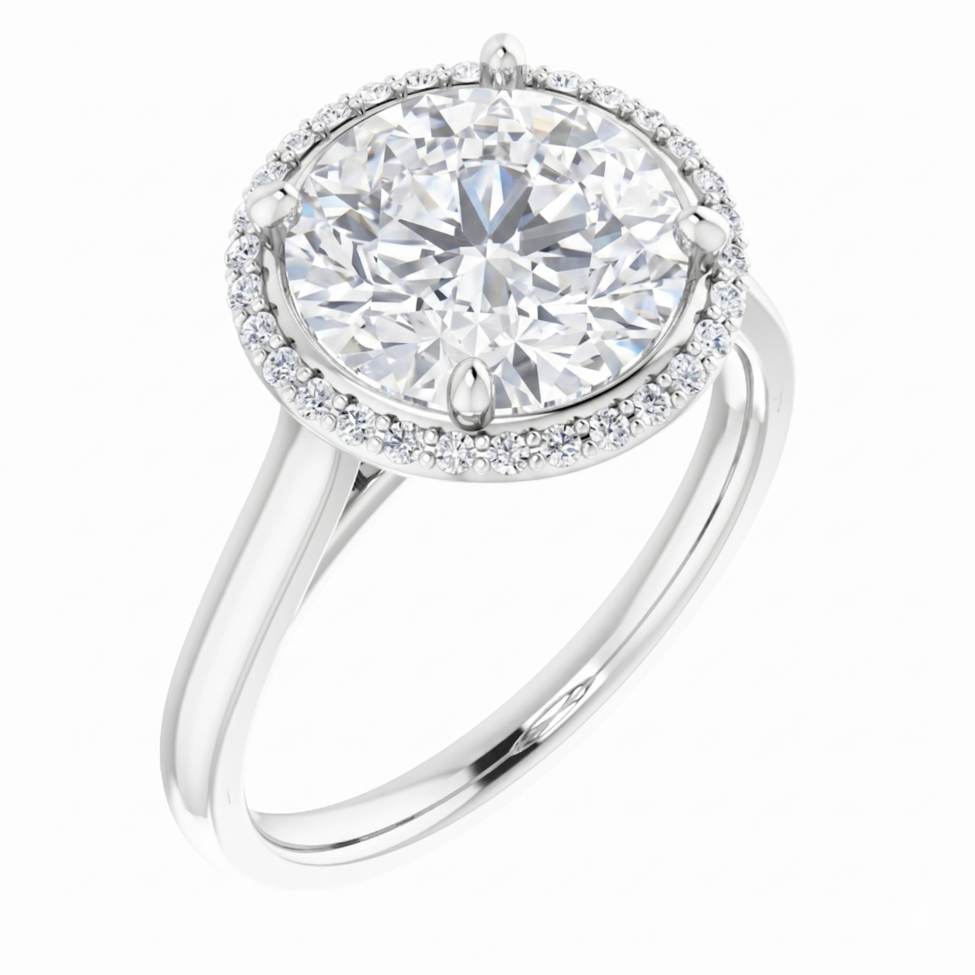 A beautiful diamond ring with a large, round brilliant cut diamond set in a halo of smaller diamonds.