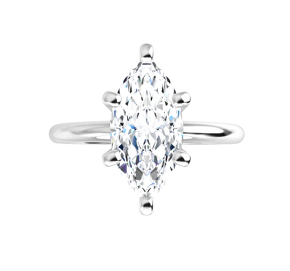 A diamond engagement ring with a large, brilliant-cut diamond set in a silver band.