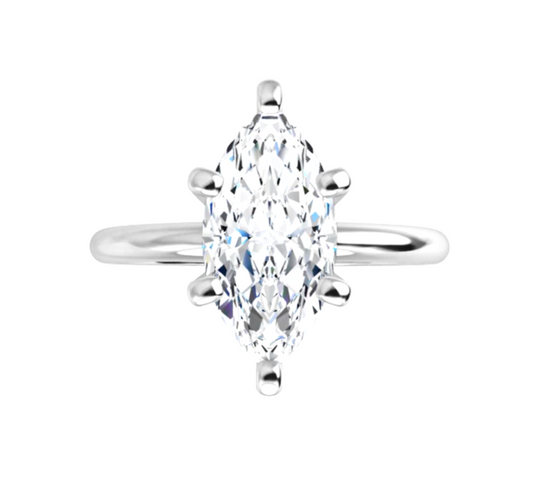 A diamond engagement ring with a large, brilliant-cut diamond set in a silver band.