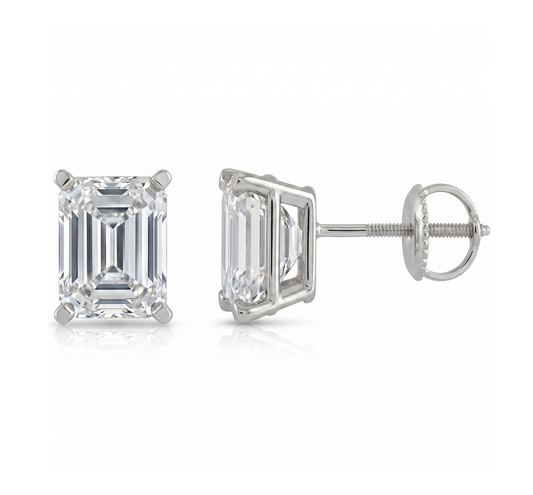 A pair of elegant diamond earrings with a large, clear gemstone set in a silver metal frame.
