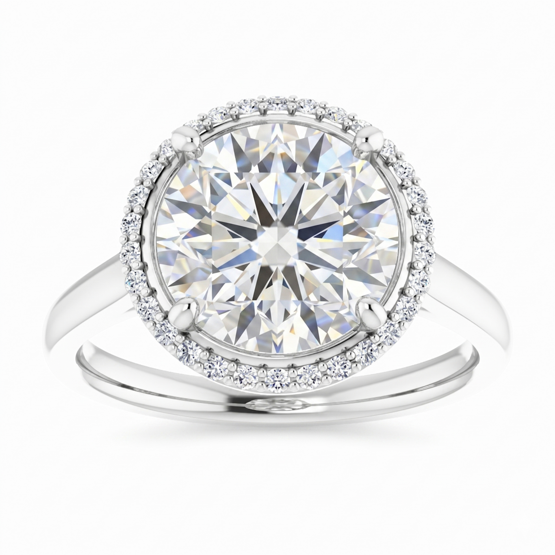 A stunning diamond engagement ring with a large, brilliant-cut diamond set in a halo of smaller diamonds, all encased in a silver band.