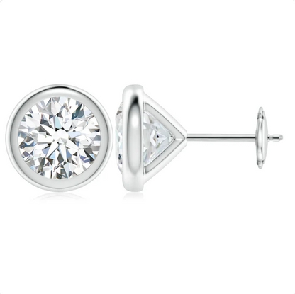 A pair of elegant silver earrings with a large, brilliant-cut diamond set in the center.
