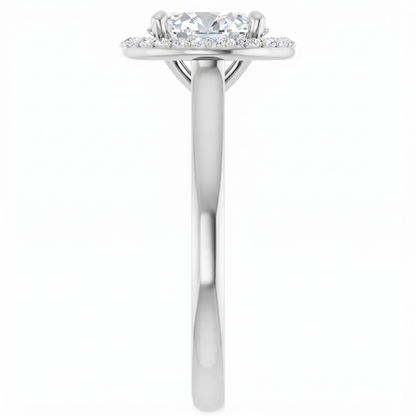 A silver engagement ring with a large central diamond surrounded by smaller diamonds.