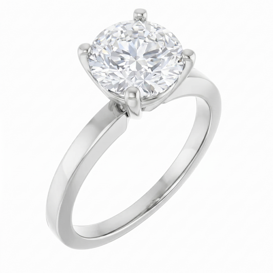 A silver engagement ring with a large, round diamond set in the center.