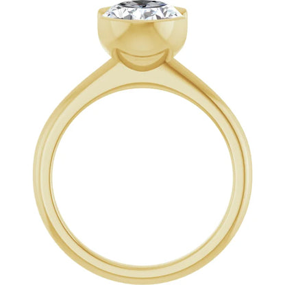 A gold ring with a large diamond set in the center.