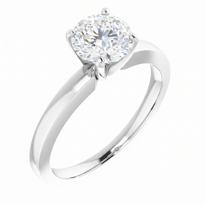 A silver engagement ring with a large, round diamond set in the center.