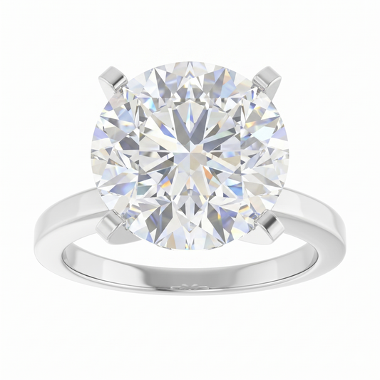 A large, brilliant round diamond engagement ring with a silver band.