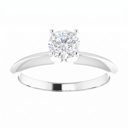 A close-up of a diamond engagement ring with a large, brilliant-cut diamond set in a silver band.