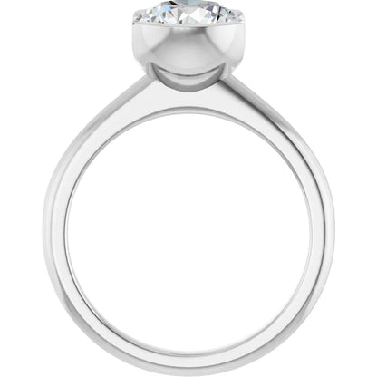 A silver engagement ring with a large diamond set in the center.
