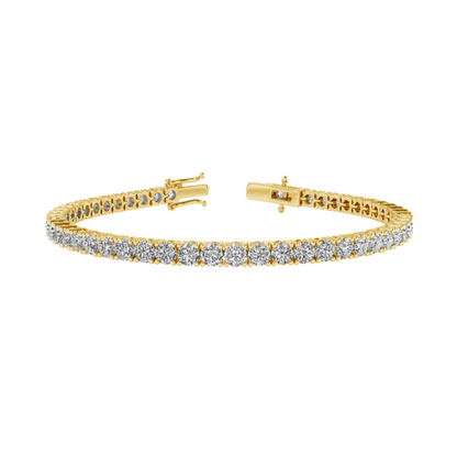 A gold bracelet with a row of diamonds set in the center.