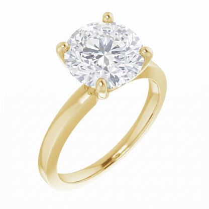 A gold engagement ring with a large, brilliant-cut diamond set in the center of the band.