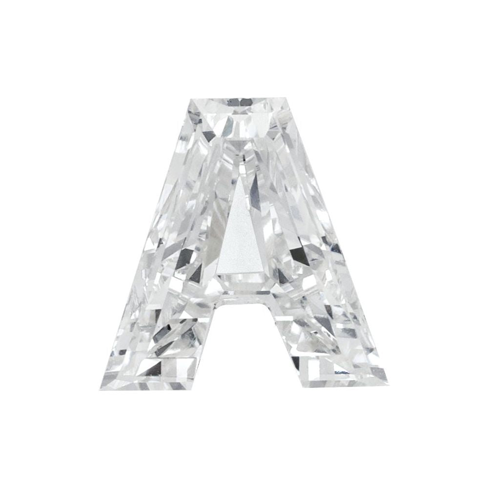 A single, clear, and sparkling diamond-like crystal or gemstone, which appears to be a letter 'A' or a similar shape.