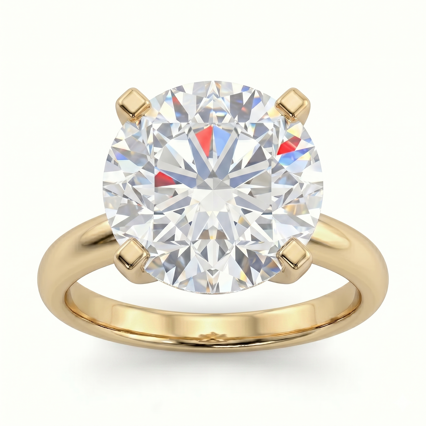 A gold ring with a large, brilliant round diamond set in the center.