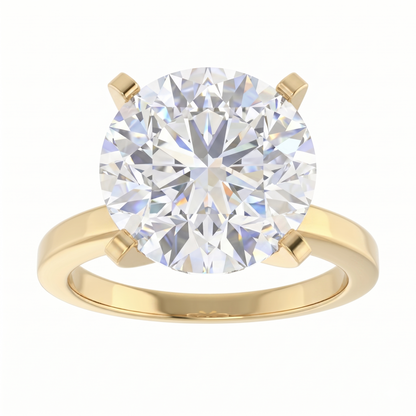 A gold ring with a large, brilliant round diamond set in the center.