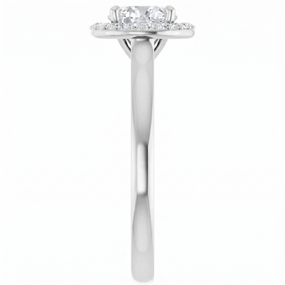 A silver engagement ring with a halo of diamonds set in the center.