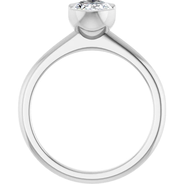 A silver engagement ring with a large diamond set in the center.