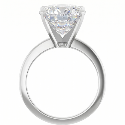 A large, clear diamond set in a silver ring.