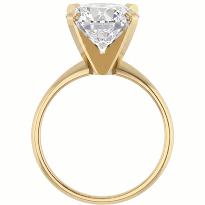 A gold ring with a large, clear diamond set in the center.