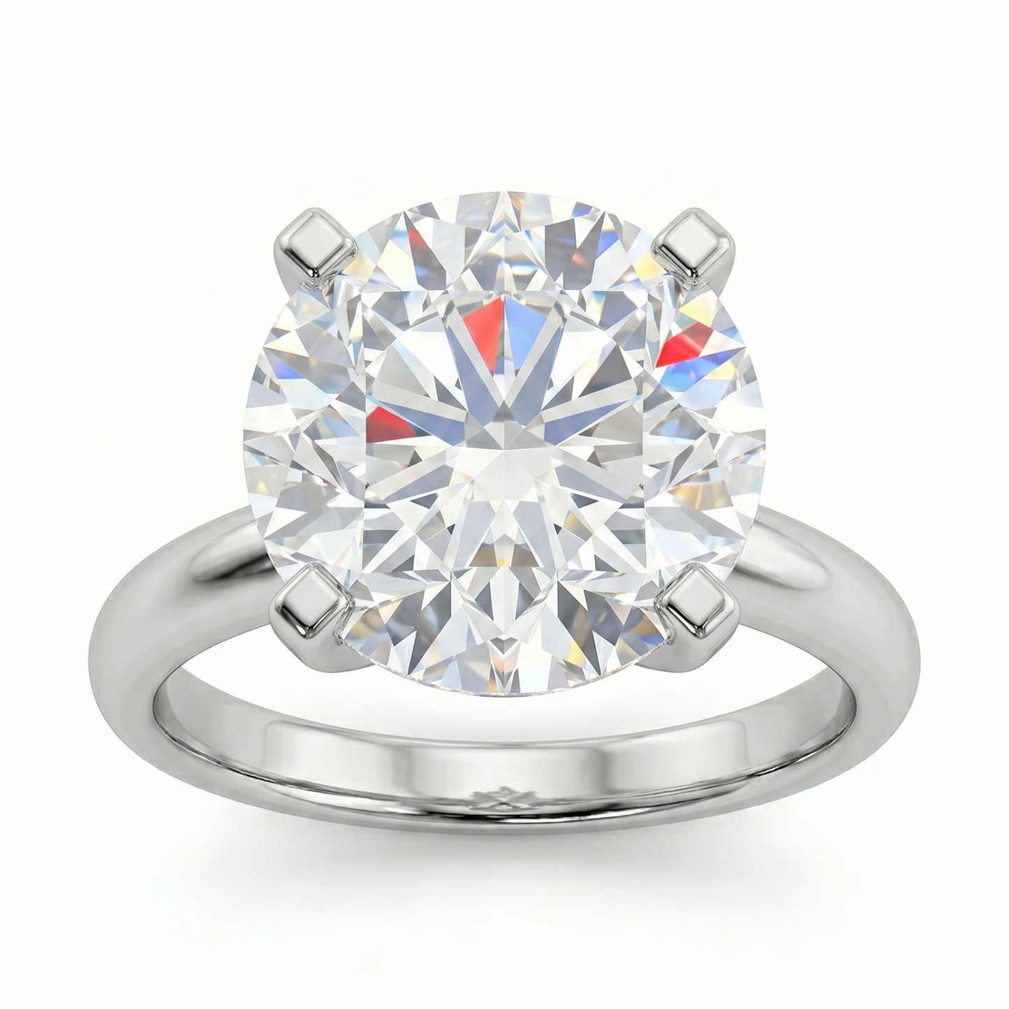 A large, brilliant diamond engagement ring with a silver band.