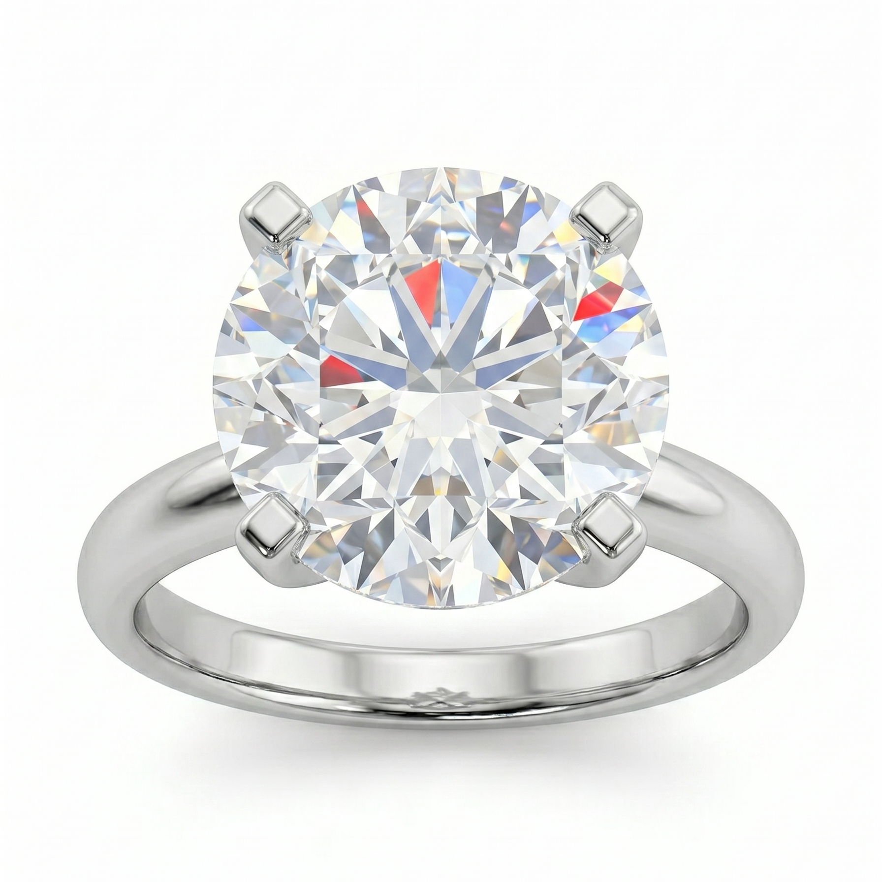 A large, brilliant diamond engagement ring with a silver band.