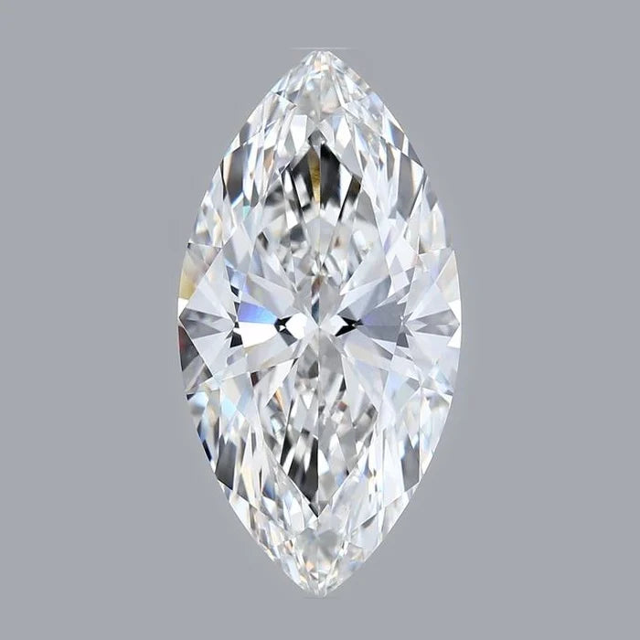 A single, clear, and brilliant diamond is the main focus of the image, set against a gray background.