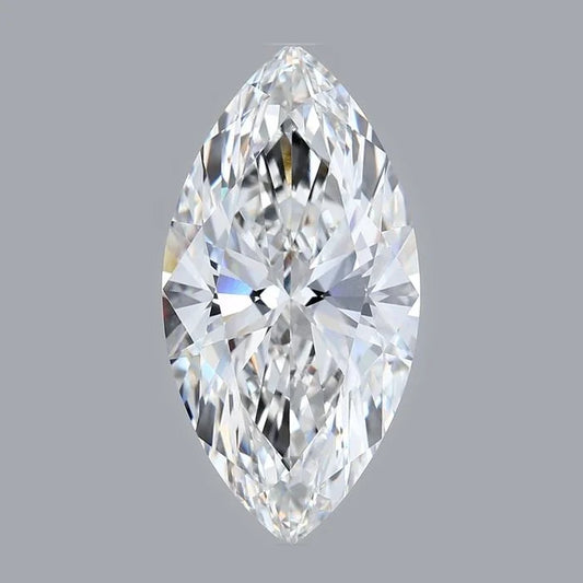A single, clear, and brilliant diamond is the main focus of the image, set against a gray background.
