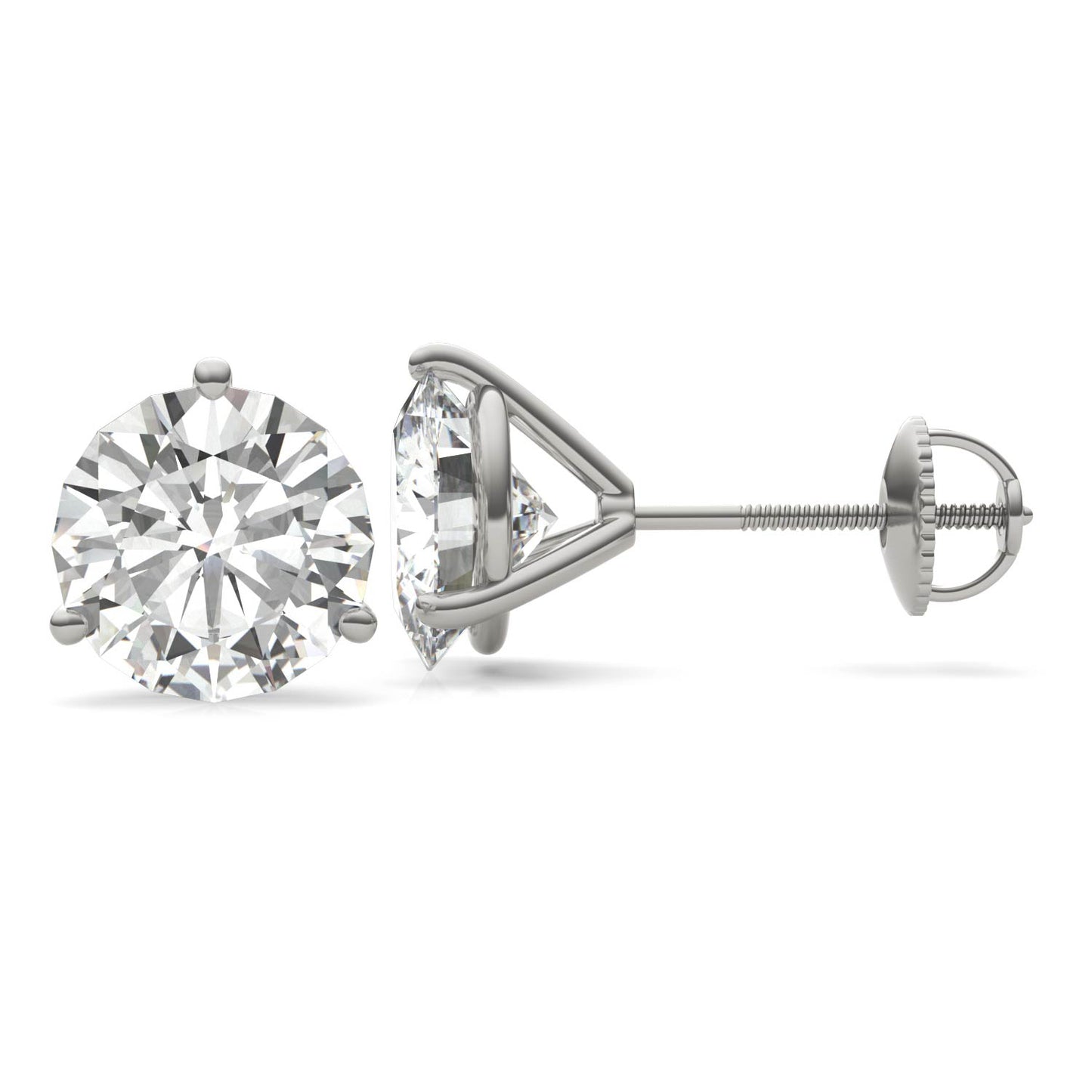 A pair of silver earrings with a large, clear diamond set in the center.