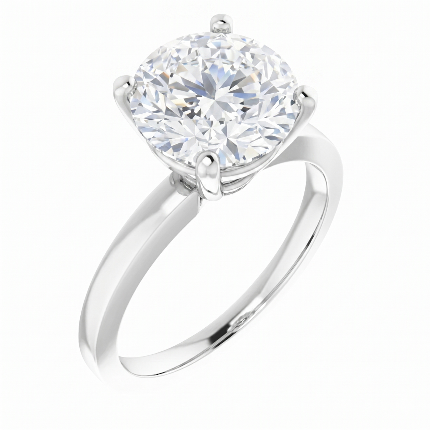 A silver engagement ring with a large, round diamond set in the center.